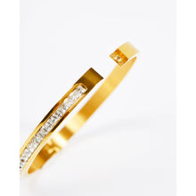 Load image into Gallery viewer, Gold Centred Cubic Zirconia Eternity Bangle
